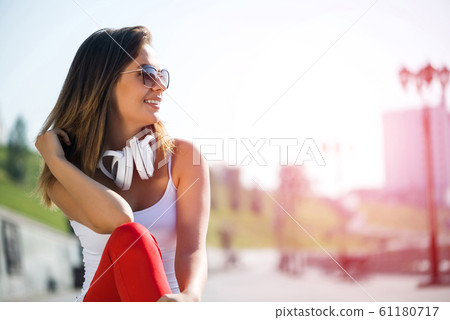 Student girl outdoors 61180717