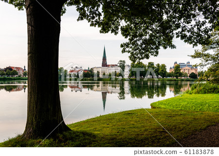 Cityscape of historic centre of Schwerin and Burgsee lake, Germany Cityscape of historic centre of Schwerin and Burgsee lake, Germany 61183878