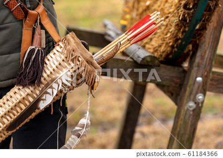 Archer with vintage quiver and wooden arrows - Archery sport 61184366