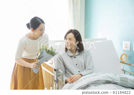 Mother and daughter  61184822