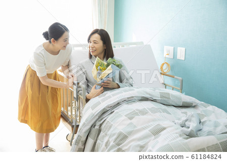 Mother and daughter  61184824