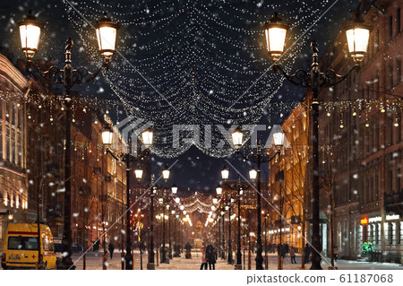 Winter Snowy Street Stables in St. Petersburg with lights and festive garlands in St. Petersburg, Russia 61187068