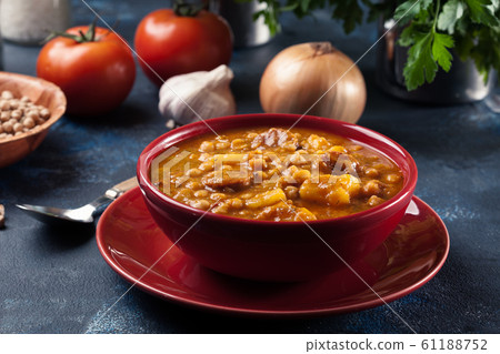 Chickpea stew with chorizo and potatoes Chickpea stew with chorizo and potatoes 61188752