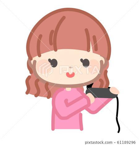 Woman applying a hair iron 61189296