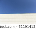 Blue sky and white wall 61191412