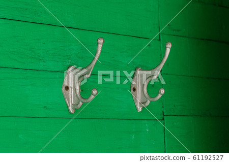 Hooks or hangers on wall of wooden house 61192527