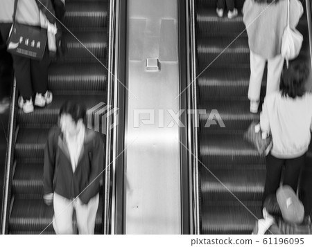business people on Elevators in metro station business people on Elevators in metro station 61196095