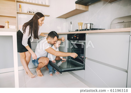 Family with little son having fun at home Family with little son having fun at home 61196318