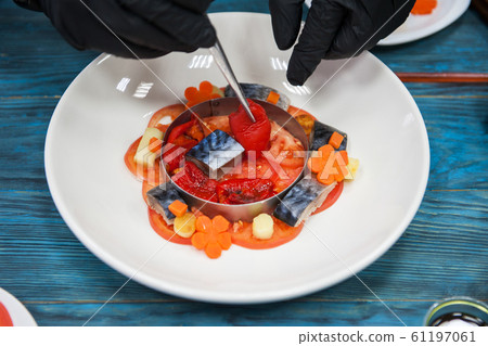 Escabeche fish dish with caviar 61197061