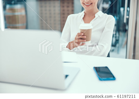 Mirthful smiling woman with coffee stock photo 61197211