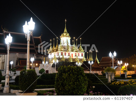 The majestic Buddhist temple in Bangkok at night. The majestic Buddhist temple in Bangkok at night. 61197407