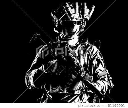 Modern army elite forces shooter in darkness 61199001