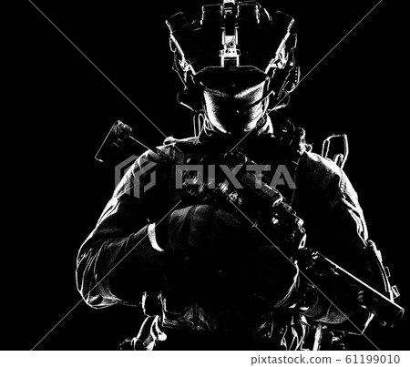 Modern army elite forces shooter in darkness 61199010