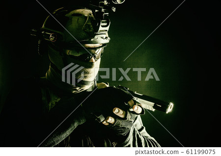 Police SWAT team fighter aiming service pistol Police SWAT team fighter aiming service pistol 61199075