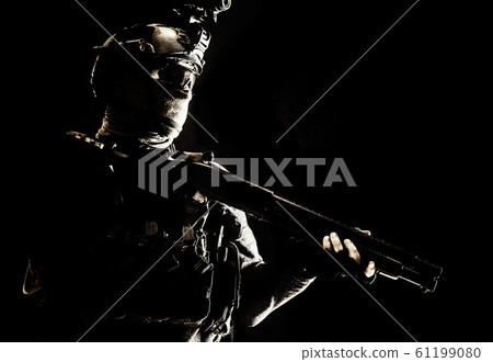 Army elite troops soldier low key studio portrait 61199080