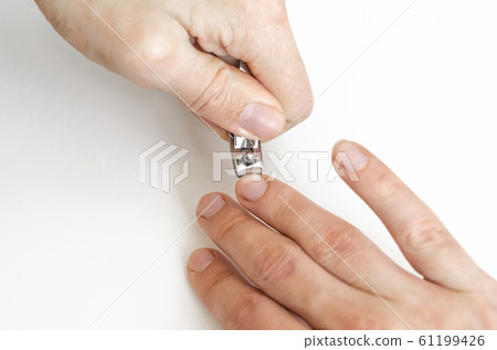 A young man does a manicure. Photo. A young man does a manicure. Photo. 61199426