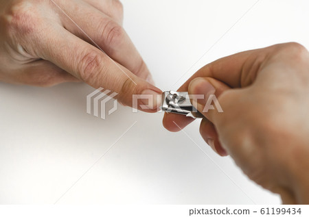 A young man does a manicure. Photo. A young man does a manicure. Photo. 61199434