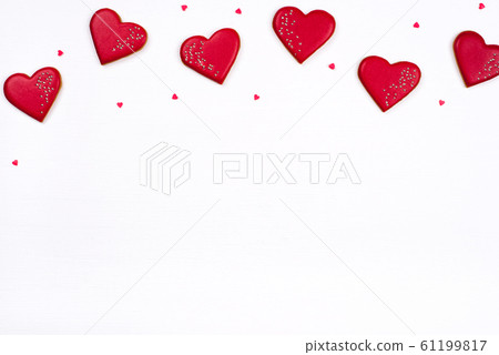 Gingerbread cookies with frosting in the shape of a heart. Gingerbread cookies with frosting in the shape of a heart. 61199817