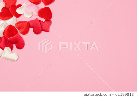 Red hearts for Valentine's day on a beautiful pink background. 61199818
