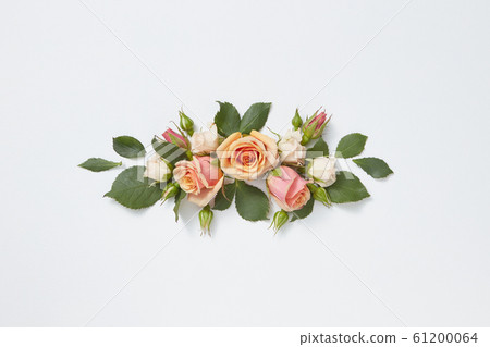 Flowers greeting card from roses and green leaves. 61200064