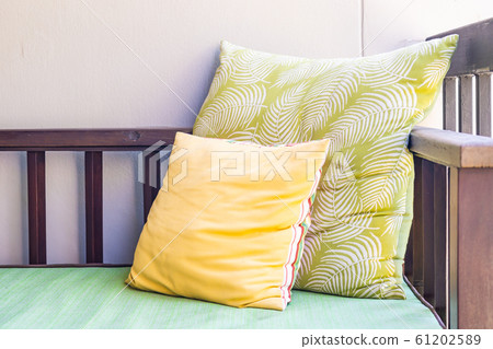 Comfortable pillow on sofa chair decoration outdoor Comfortable pillow on sofa chair decoration outdoor 61202589