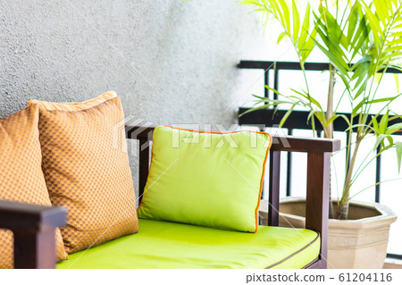 Pillow on sofa decoration around outdoor patio 61204116