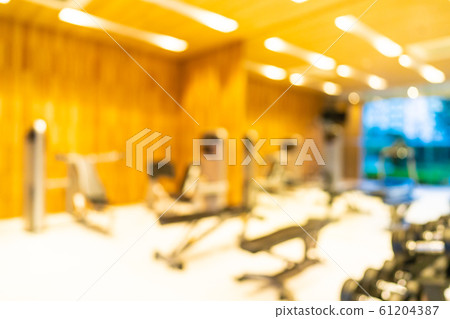 Abstract blur gym room interior with fitness equipment Abstract blur gym room interior with fitness equipment 61204387