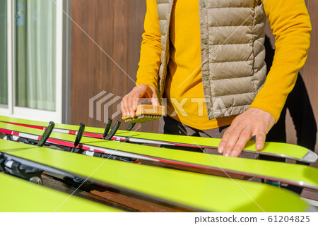 Skiing, waxing, brush, maintenance, care, hobby, senior Skiing, waxing, brush, maintenance, care, hobby, senior 61204825