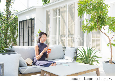 Traveling alone image woman Traveling alone image woman 61204969