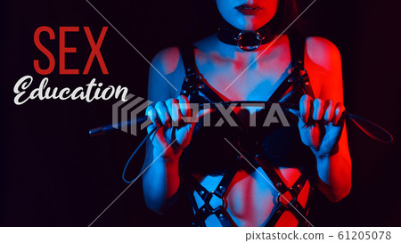 girl in a leather belt with a leather whip for BDSM sex girl in a leather belt with a leather whip for BDSM sex 61205078