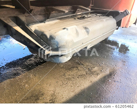 Old rusty worn large gas tank for refueling a Old rusty worn large gas tank for refueling a 61205462