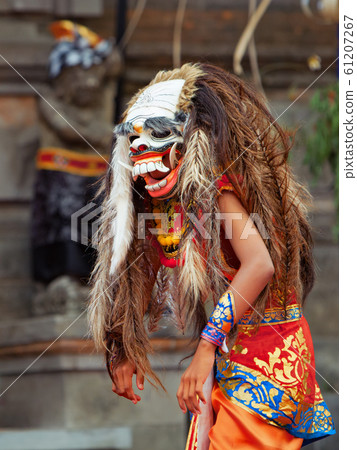 Dancer in traditional Balinese mask of demon 61207267