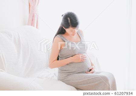 pregnant, pregnant woman, last month of pregnancy 61207934