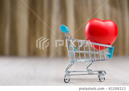Red heart in the shopping cart Red heart in the shopping cart 61208121
