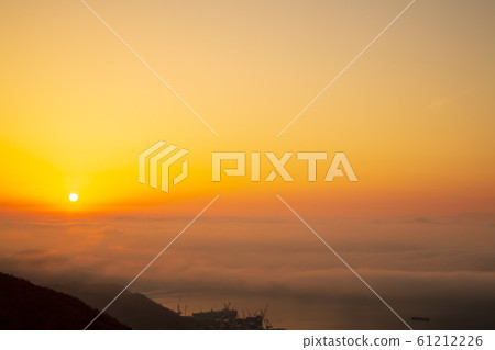 The rising sun over the sea of clouds in Setouchi The rising sun over the sea of clouds in Setouchi 61212226