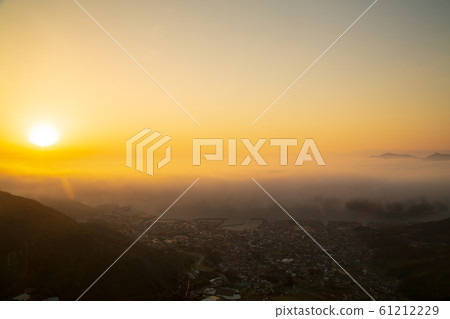 The rising sun over the sea of clouds in Setouchi 61212229