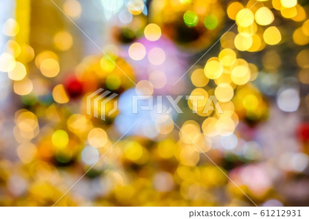 Orange, yellow and white bokeh light at Festival. Abstract or blurred of light glitter. Glow texture background. Orange, yellow and white bokeh light at Festival. Abstract or blurred of light glitter. Glow texture background. 61212931