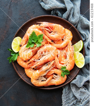 Shrimps served on a plate 61213488