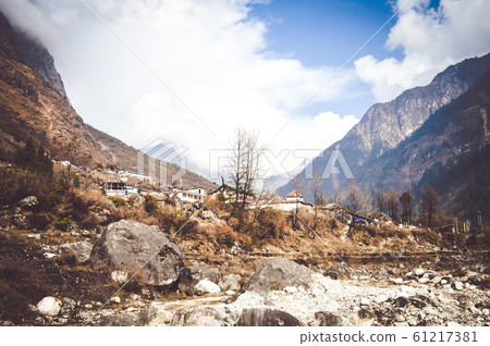 Picturesque mountain valley landscape scenery in one summer morning panoramic view. Picturesque mountain valley landscape scenery in one summer morning panoramic view. 61217381