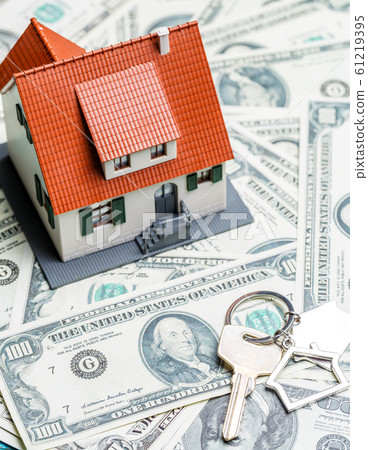 Picture of toy house on dollars and key Picture of toy house on dollars and key 61219395