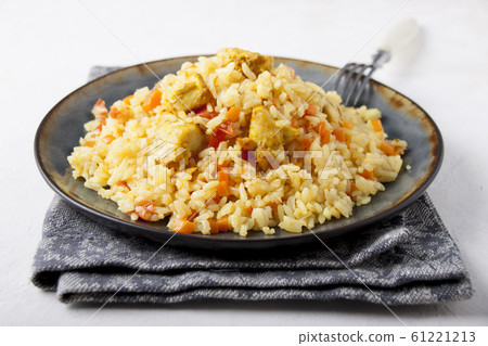 Chicken Pilaf with vegetables and spices Chicken Pilaf with vegetables and spices 61221213