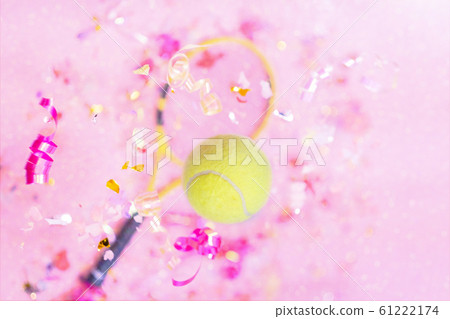 yellow tennis ball on pink background flying tennis sport party concept 61222174