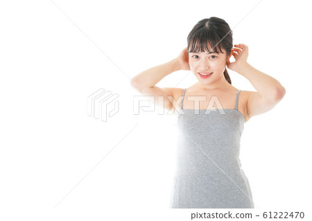 A young woman doing beauty care A young woman doing beauty care 61222470