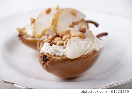 Baked pear with curd filling Baked pear with curd filling 61223379