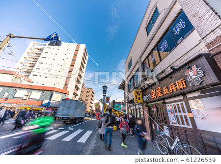 Japan's Kawasaki cityscape, with views of Omotesando leading from Kawasaki Daishi Station to Kawasaki Daishi Japan's Kawasaki cityscape, with views of Omotesando leading from Kawasaki Daishi Station to Kawasaki Daishi 61226539