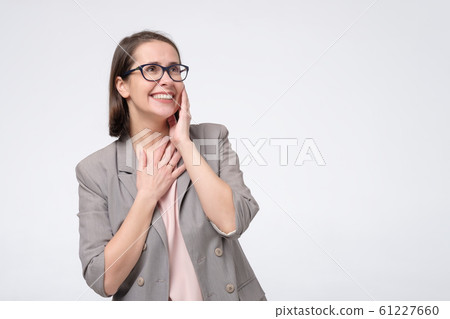 Laughing mature businesswoman in glasses laughing on joke. Laughing mature businesswoman in glasses laughing on joke. 61227660