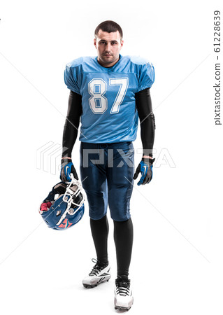 American Football Player with blue uniform on the scrimmage line. White background 61228639