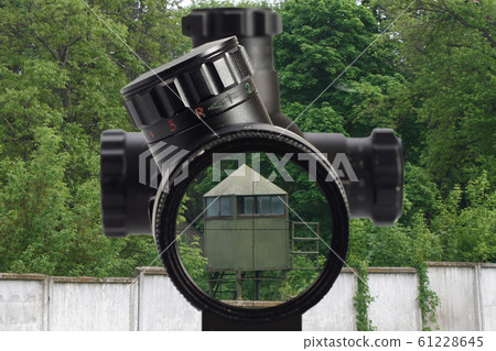 sniper look through the optical sight  61228645