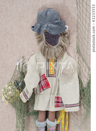 Face in hole doll on the fair 61233553