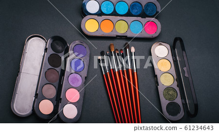 set of makeup brushes and palette with color eye shadow set of makeup brushes and palette with color eye shadow 61234643